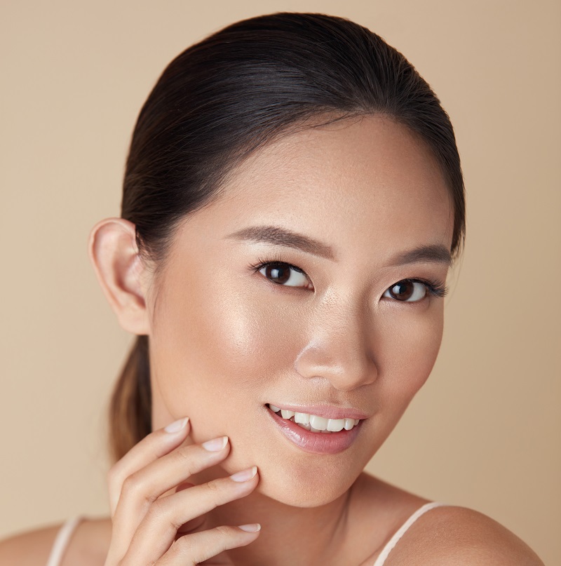 Beautyasianwomanportraitbeautifulmodeltouchingfaceandlooking | Cornerstone Plastic Surgery 