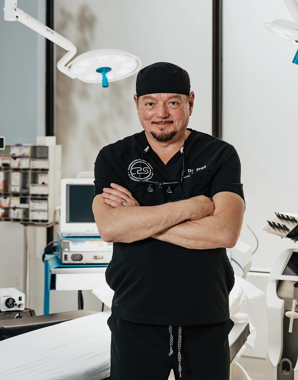Trusted Plastic Surgery Near Toms River: Board-certified surgeon standing in a modern operating room